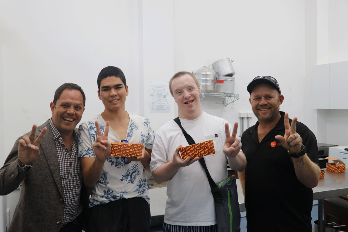 Alastair Mcleod visiting students during cooking class at STEPS Pathways College