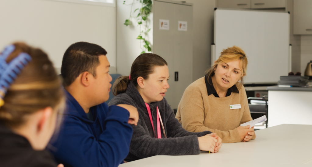 STEPS Pathways College Boarding College participants sitting inside a training room.