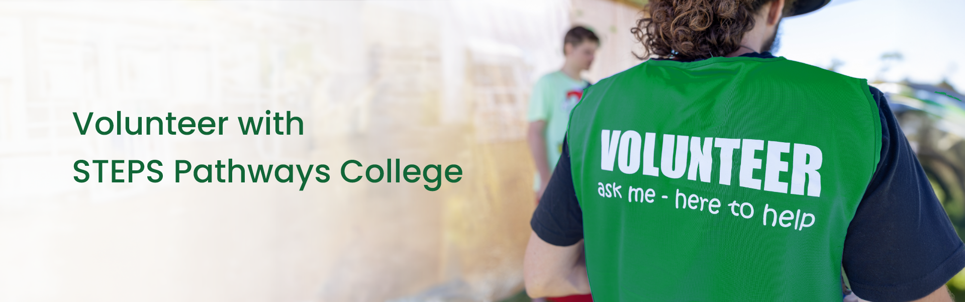 A green vest worn by a STEPS volunteer with the text 'VOLUNTEER. ask me - here to help'. The title text 'Volunteer with STEPS Pathways College' is also present.