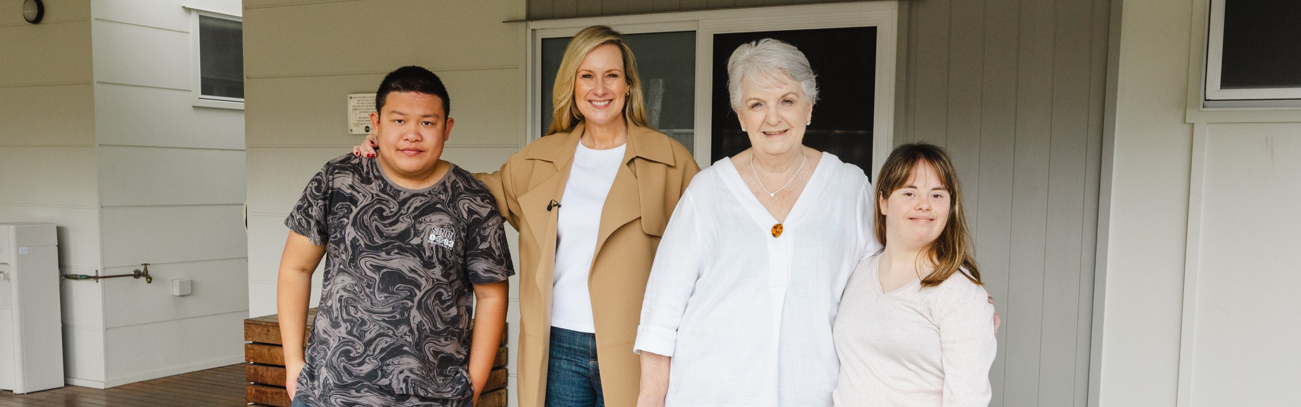 STEPS Pathways College Ambassador, Melissa Doyle, standing alongside STEPS Managing Director, Carmel Crouch and two STEPS Pathways College participants.