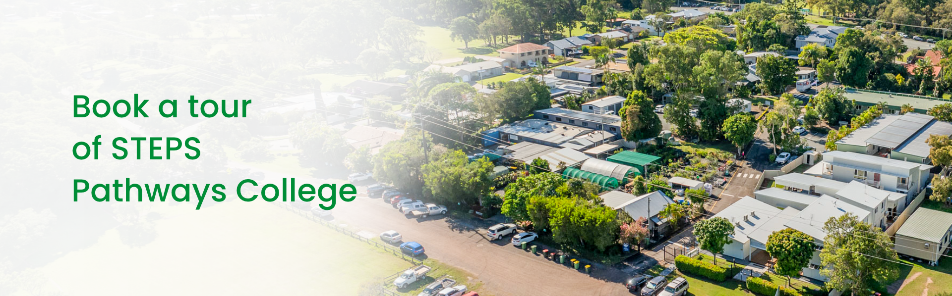 Aerial view of STEPS Pathways College campus with buildings, trees, and surrounding neighbourhood.