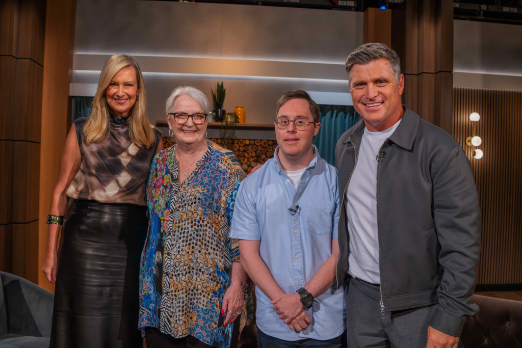 Melissa Doyle, Carmel Crouch, Tom, and Shane Crawford standing together on the House of Wellness TV set.