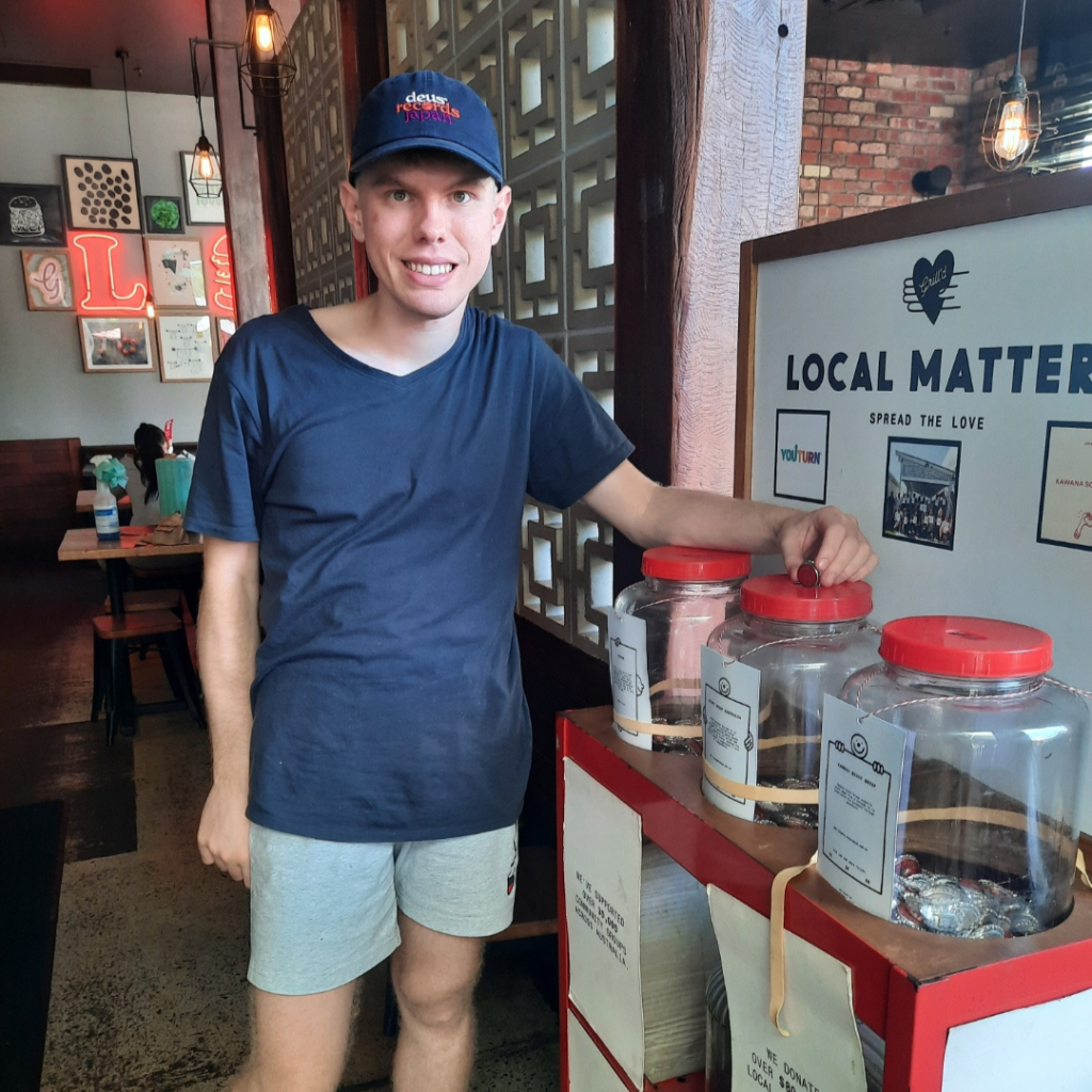 Jack voting for STEPS Pathways Charity for Grill’d Kawana’s Local Matters program.