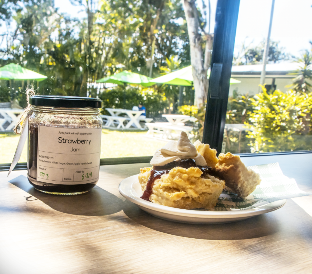 Fresh scons and a jar of Pathways to Plate Strawberry Jam