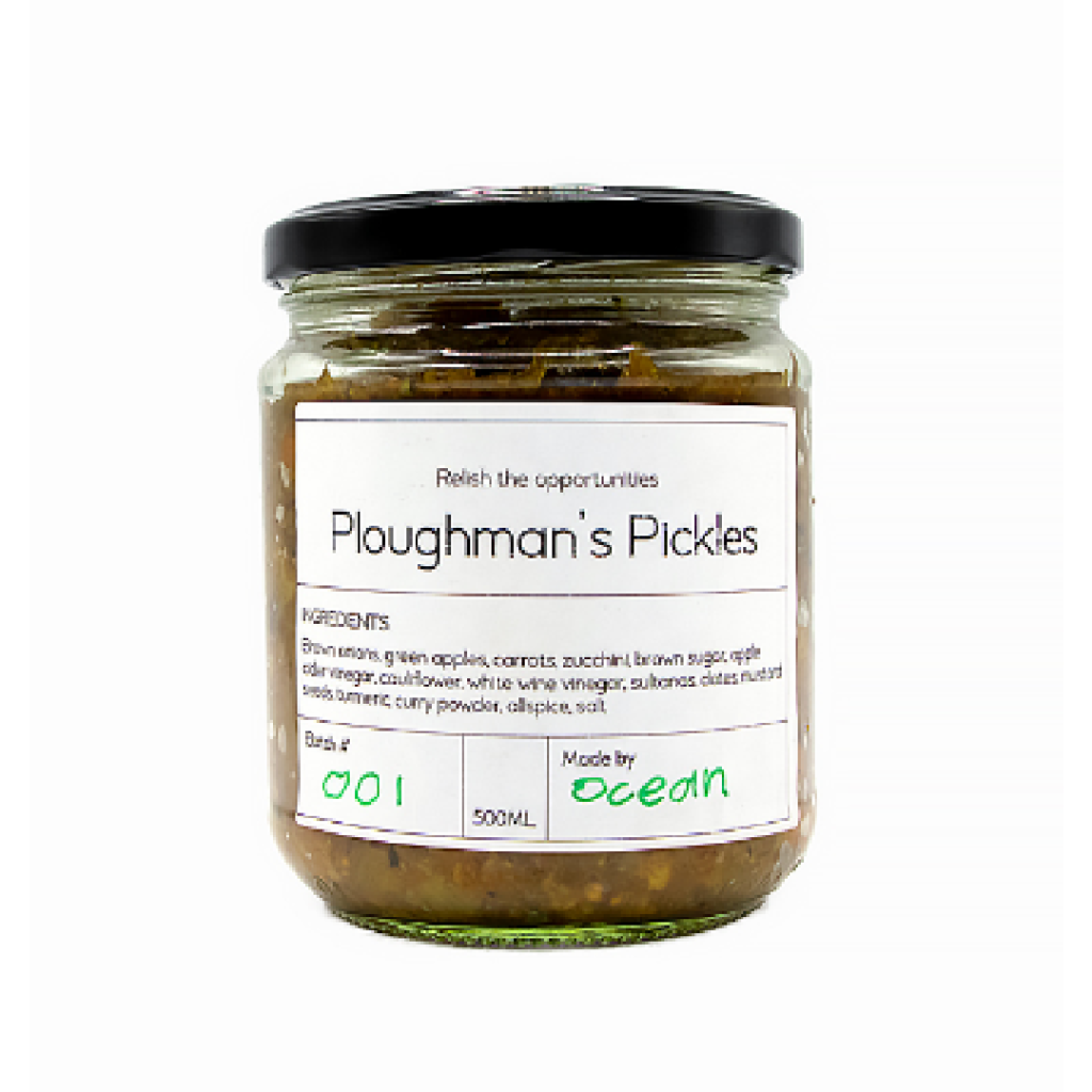 Glass jar of Ploughman’s Pickles with a black lid and product label, showcasing a pickled relish created through the Pathways to Plate program.