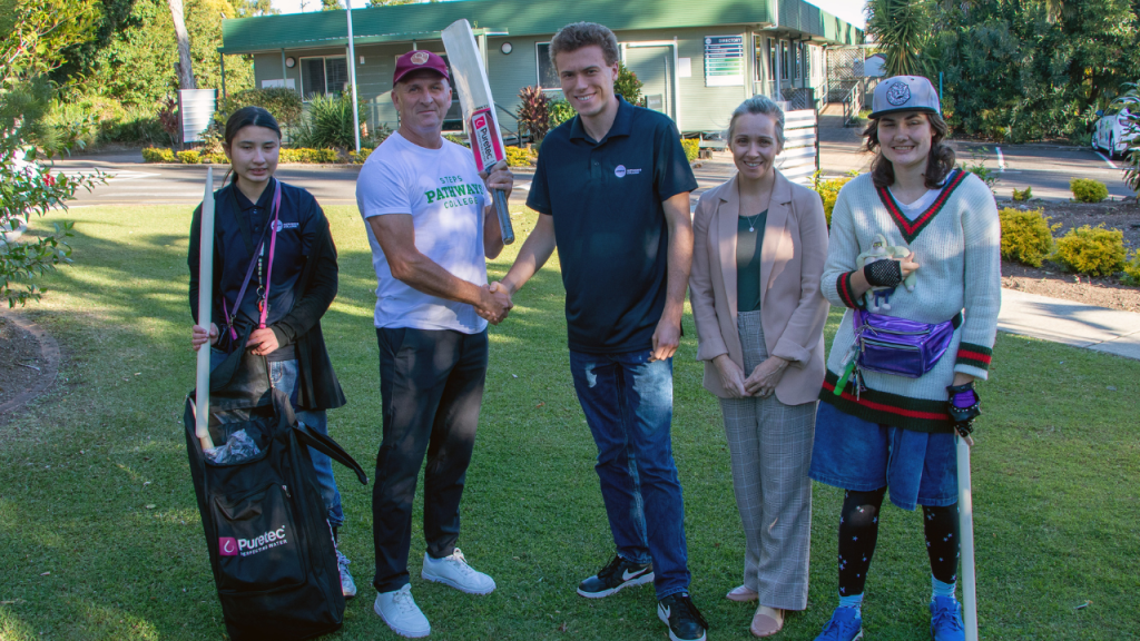 Cricket player, Steven Hill with STEPS Pathways College team and students